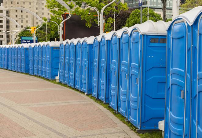 a row of sleek and modern portable restrooms at a special outdoor event in Bell Gardens